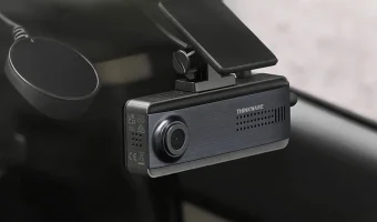 A dashcam in a car window