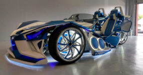 Slingshot car with futuristic lighting and color scheme