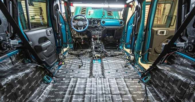 The inside of a vehicle getting a sound deadening upgrade