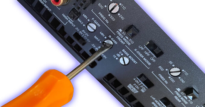 A car audio amplifier being set